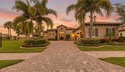 Positioned on a premier homesite with water on two sides and for sale in Lakewood Ranch Florida Manatee County County on GolfHomes.com