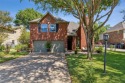 Charming two-story traditional on a deep lot, backing up to for sale in Garland Texas Dallas County County on GolfHomes.com