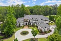 Experience elevated living in The Manor Golf & Country Club for sale in Alpharetta Georgia Fulton County County on GolfHomes.com