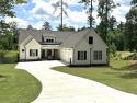 Another new home by Green Park Homes! This home includes a for sale in Eatonton Georgia Putnam County County on GolfHomes.com