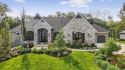 Luxury and modern elegance converge in this custom reverse 1 for sale in Olathe Kansas Johnson County County on GolfHomes.com