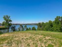 Nestled with breathtaking views of the main channel, this for sale in Lenoir City Tennessee Loudon County County on GolfHomes.com