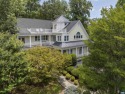 Set on a quiet cul-de-sac in Glenmore, this distinctive for sale in Keswick Virginia Albemarle County County on GolfHomes.com