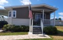 Almost new 2 bedroom, 2 bath manufactured 2019 home with an open for sale in Naples Florida Collier County County on GolfHomes.com