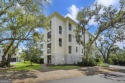 The view of Jekyll Harbor takes center stage in this 3 bedroom 3 for sale in Jekyll Island Georgia Glynn County County on GolfHomes.com