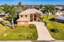 Welcome to paradise in Southwest Cape Coral! This luxurious for sale in Cape Coral Florida Lee County County on GolfHomes.com