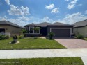 Ake view home !!!Still has the BUILDER WARRANTY !! This DR for sale in Palm Bay Florida Brevard County County on GolfHomes.com