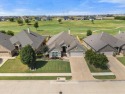 Welcome to your dream home perfectly situated on a quiet street for sale in Benbrook Texas Tarrant County County on GolfHomes.com