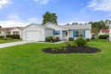 Welcome Home!  This beautiful Maverick Model with added bonus for sale in The Villages Florida Sumter County County on GolfHomes.com