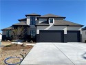 Carrington IV by Ben Cerra Construction. This stunning 1.5 story for sale in Kansas City Missouri Clay County County on GolfHomes.com