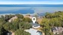 Exquisite custom residence offering breathtaking bay views! for sale in Destin Florida Okaloosa County County on GolfHomes.com