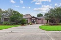 This remarkable custom-built and architect designed, one-owner for sale in Gretna Louisiana Jefferson Parish County on GolfHomes.com