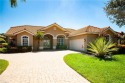 WOW... THIS MAGNIFICENT HOME IS READY FOR YOU TO WALK IN AND for sale in Bonita Springs Florida Lee County County on GolfHomes.com