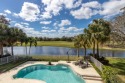 Stunning 6 bedroom/3 bath pool home sits on the lake with golf for sale in Jupiter Florida Palm Beach County County on GolfHomes.com