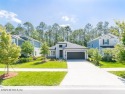 Welcome to your dream home in highly sought after Eagle Landing for sale in Middleburg Florida Clay County County on GolfHomes.com