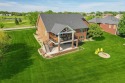 This gorgeous ranch home boasts over 5493 finished sf and backs for sale in Boone Iowa Boone County County on GolfHomes.com