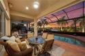 This sought-after Aragon model sits on a premium lakefront lot for sale in Estero Florida Lee County County on GolfHomes.com