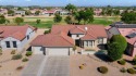 Discover this popular Palo Verde model nestled on the 7th green for sale in Surprise Arizona Maricopa County County on GolfHomes.com