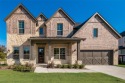 At 2,995 sq. ft., the Alexander II is a striking two-story home for sale in Gunter Texas Grayson County County on GolfHomes.com