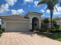 Exterior of house just painted light cream. Now is your chance for sale in Boynton Beach Florida Palm Beach County County on GolfHomes.com