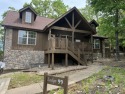 Discover the perfect blend of comfort and elegance in this for sale in Branson West Missouri Stone County County on GolfHomes.com