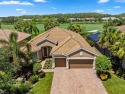 This beautiful DUNWOODY floor plan is located on the 2nd fairway for sale in Ave Maria Florida Collier County County on GolfHomes.com