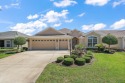 Lovely 3/2 Iris with a 2 Car + Golf Cart Garage in the Highly for sale in The Villages Florida Sumter County County on GolfHomes.com