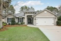 This stunning home offers the perfect blend of luxury, comfort for sale in Orange Park Florida Clay County County on GolfHomes.com