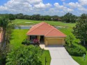 Sprawling View of Pond and Golf Course here in the areas ONLY for sale in Bradenton Florida Manatee County County on GolfHomes.com