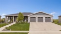 This zero-entry ranch home offers a blend of comfort and modern for sale in Ankeny Iowa Polk County County on GolfHomes.com