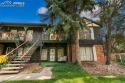 Look for the yellow door! Move-in ready 2nd story condo with for sale in Colorado Springs Colorado El Paso County County on GolfHomes.com