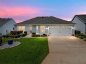 Welcome to this Lovely 3-bedroom 2, bath two car garage w/ GOLF for sale in The Villages Florida Marion County County on GolfHomes.com