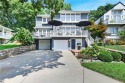Wake up each day to the peaceful beauty of Lake Quivira in this for sale in Lake Quivira Kansas Wyandotte County County on GolfHomes.com