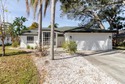 Short Sale. Step into this stunning split-floor plan residence for sale in Tarpon Springs Florida Pinellas County County on GolfHomes.com