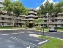 Welcome to this beautifully updated 2-bedroom, 2-bath apartment for sale in Pembroke Pines Florida Broward County County on GolfHomes.com