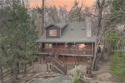 Experience the epitome of mountain living in this charming for sale in Big Bear Lake California San Bernardino County County on GolfHomes.com
