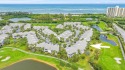 Located in the gated neighborhood Estuary at Jupiter Dunes, the for sale in Jupiter Florida Palm Beach County County on GolfHomes.com