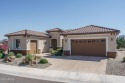 You'll love this highly-upgraded extended SERENITY on a huge 1/3 for sale in Buckeye Arizona Maricopa County County on GolfHomes.com