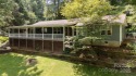 Welcome to a bit of seclusion in the city! You'll find beautiful for sale in Asheville North Carolina Buncombe County County on GolfHomes.com