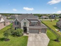 Nestled within a thoughtfully planned golf course community for sale in Gunter Texas Grayson County County on GolfHomes.com