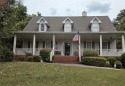 PRICE IMPROVEMENT on this charming 5 bedroom/4.5 bath Cape for sale in Snellville Georgia Gwinnett County County on GolfHomes.com