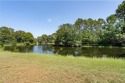 Beautiful, level lot in Riviere Du Chien Country Club Estates for sale in Mobile Alabama Mobile County County on GolfHomes.com