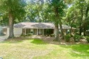Discover Your Dream Home Nestled in Majestic Live Oaks! Welcome for sale in Pensacola Florida Escambia County County on GolfHomes.com