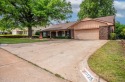 Large beautiful home overlooking the 11th tee of the Surrey for sale in Yukon Oklahoma Canadian County County on GolfHomes.com