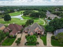 Experience elevated living in this exceptional Walnut Estates for sale in Mansfield Texas Tarrant County County on GolfHomes.com