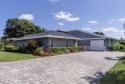 This home has been lovingly updated with large porcelain floors for sale in Palm Beach Gardens Florida Palm Beach County County on GolfHomes.com