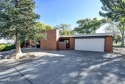 Move in ready! Super Cozy Frank Lloyd Wright type, red brick for sale in Prescott Arizona Yavapai County County on GolfHomes.com