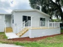 Welcome to your dream waterfront retreat at Pine Lake's Country for sale in N. Fort Myers Florida Lee County County on GolfHomes.com