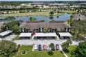 Don't miss out on this first floor unit w/amazing lake & golf for sale in Vero Beach Florida Indian River County County on GolfHomes.com