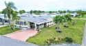 Great opportunity! Rehab needed for roof wall leak but priced for sale in Barefoot Bay Florida Brevard County County on GolfHomes.com